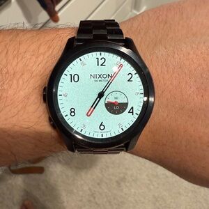 Nixon hi-lo tide Black titanium with Light Blue reflective Dial